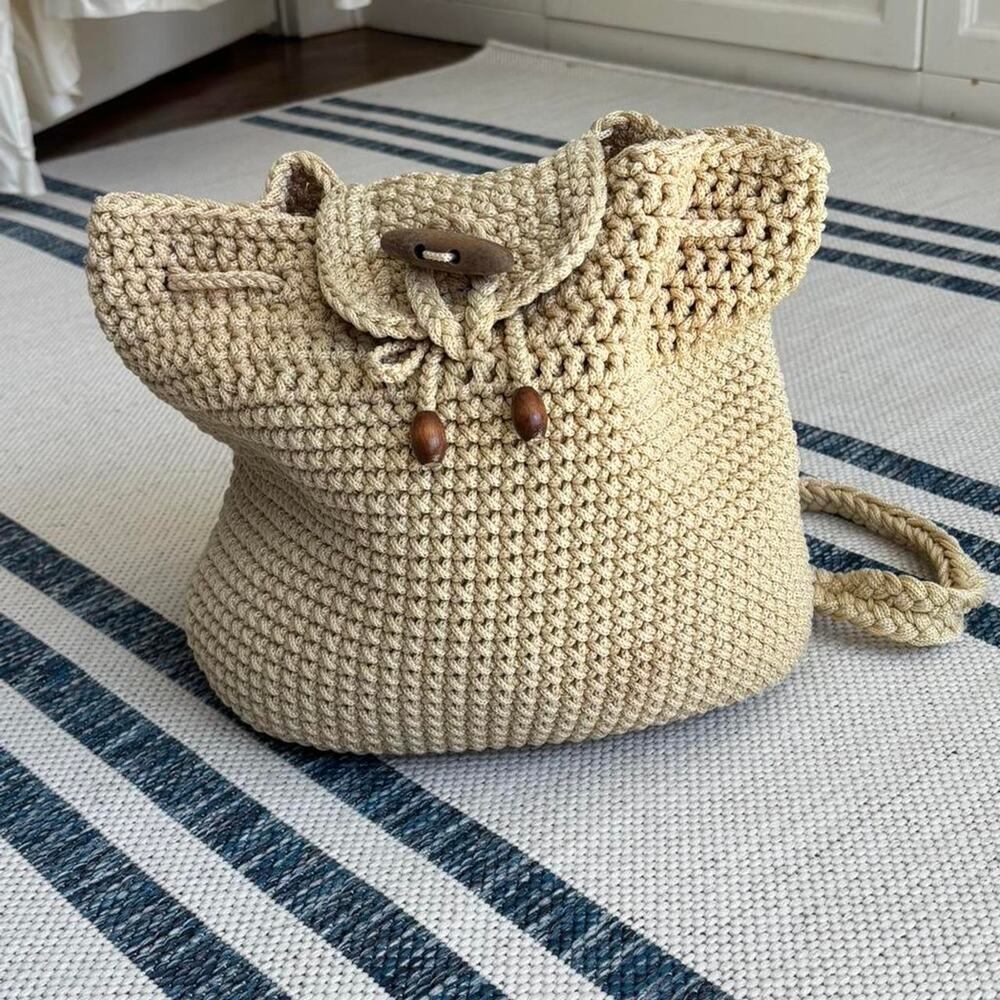 Cream crochet bucket backpack bag